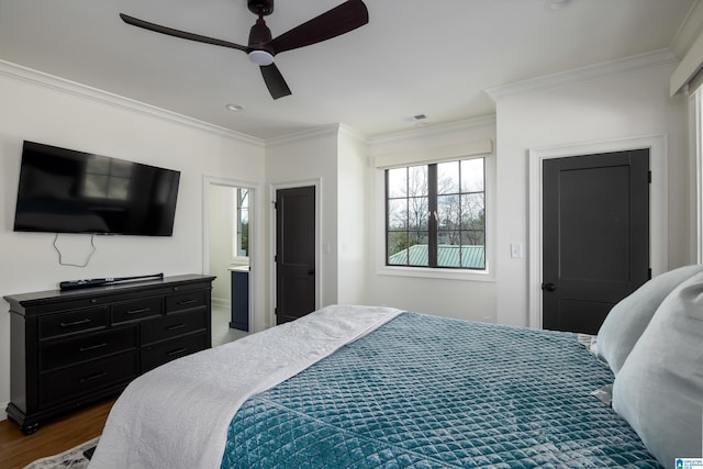 bedroom with ceiling fan, ensuite bathroom, crown molding, and dark hardwood / wood-style floors