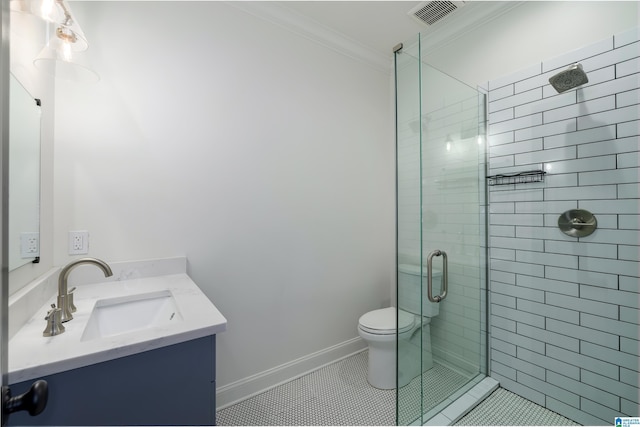 bathroom featuring toilet, crown molding, tile patterned floors, vanity, and an enclosed shower