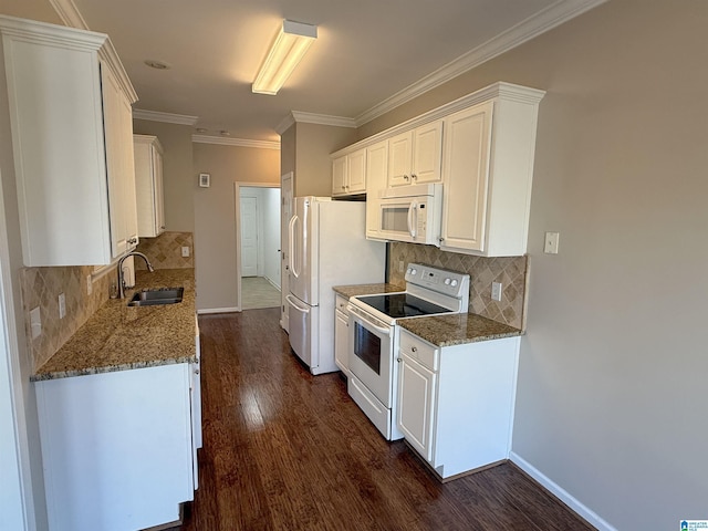 kitchen featuring white cabinets, white appliances, dark wood-type flooring, and dark stone countertops