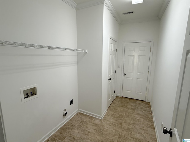 laundry area featuring electric dryer hookup, washer hookup, and ornamental molding