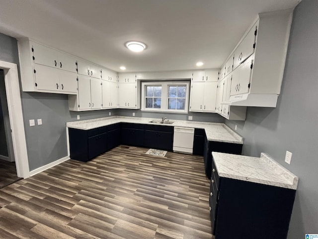 kitchen featuring dishwasher, white cabinetry, sink, and dark wood-type flooring