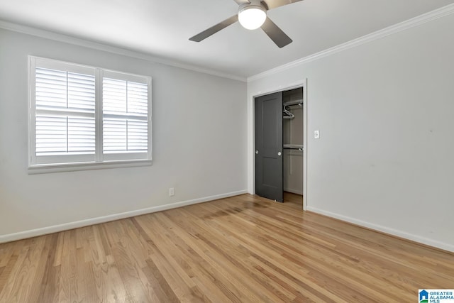 unfurnished bedroom featuring a closet, ceiling fan, ornamental molding, and light hardwood / wood-style flooring