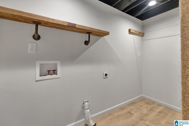 laundry room featuring hookup for an electric dryer, light hardwood / wood-style floors, and washer hookup