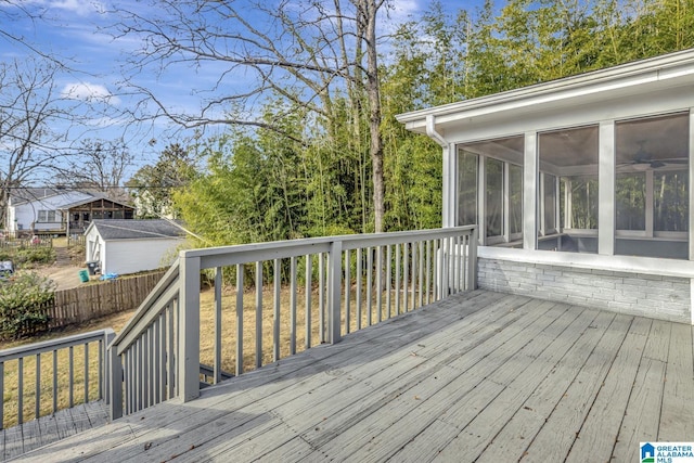 wooden terrace featuring a sunroom