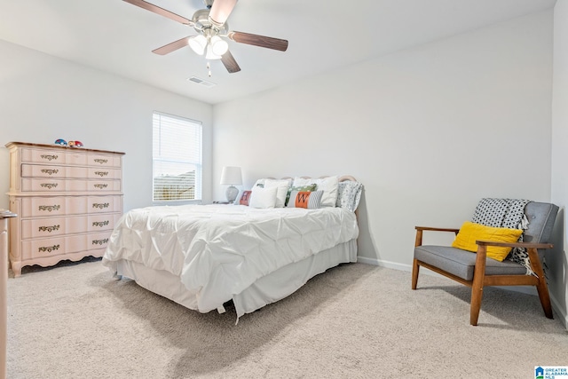 carpeted bedroom featuring ceiling fan