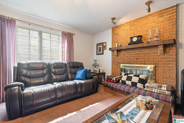 carpeted living room with a textured ceiling and a brick fireplace