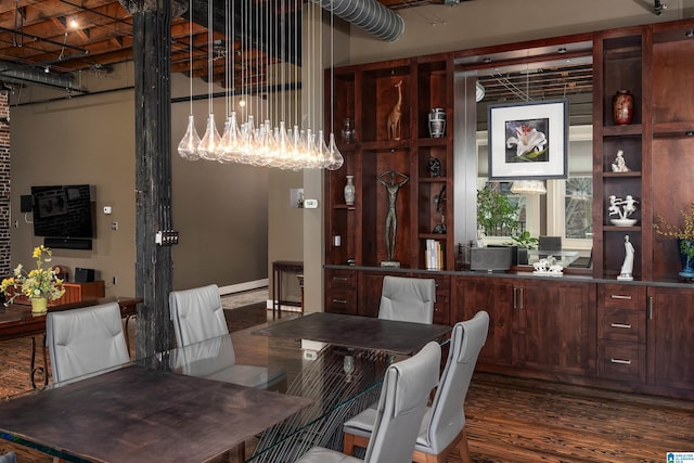 dining room with dark hardwood / wood-style flooring