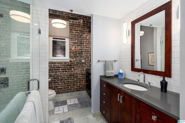 bathroom featuring toilet, vanity, and walk in shower