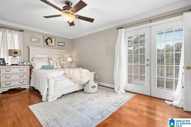 bedroom with access to exterior, ceiling fan, crown molding, and light wood-type flooring