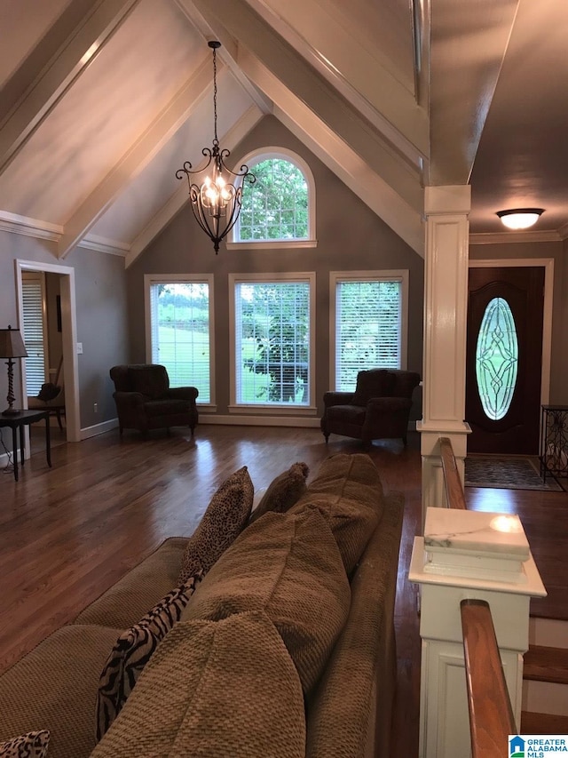 living room featuring beam ceiling, ornate columns, dark hardwood / wood-style flooring, high vaulted ceiling, and a notable chandelier