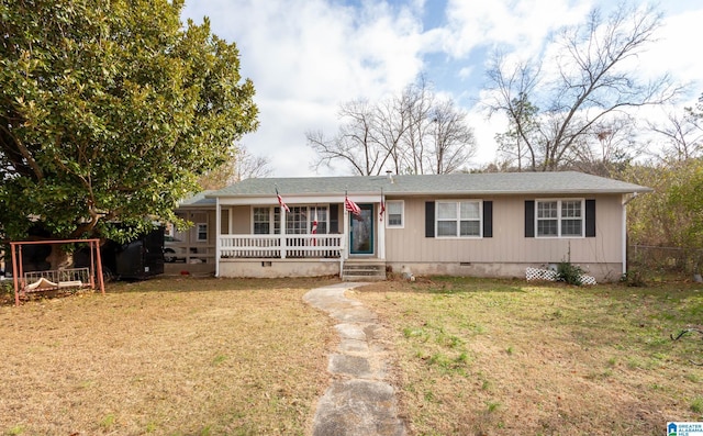 view of front of home with a porch and a front yard