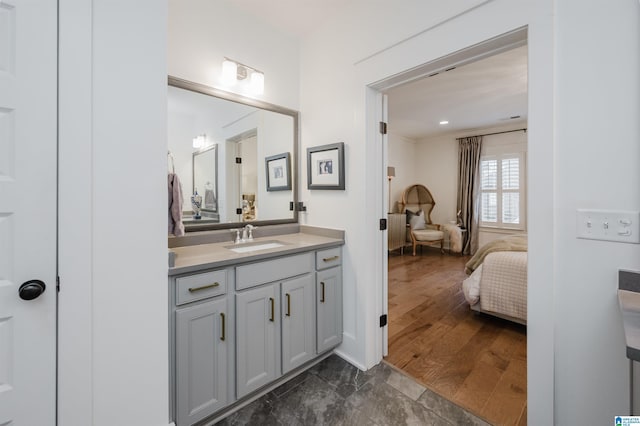 bathroom featuring vanity and hardwood / wood-style flooring