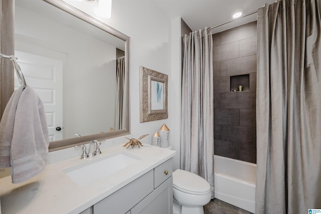 full bathroom featuring vanity, toilet, and shower / bath combo