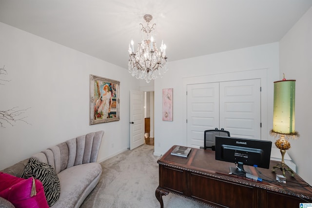 home office with a notable chandelier and light colored carpet