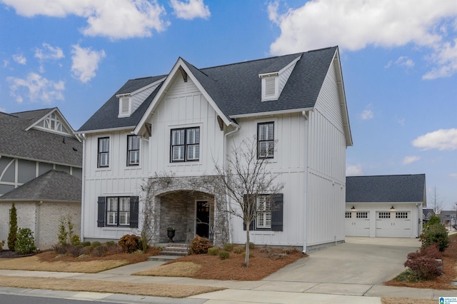 modern inspired farmhouse featuring a garage