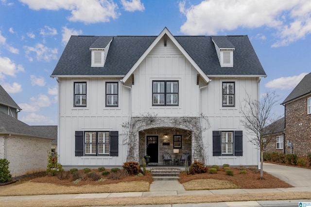 modern inspired farmhouse with covered porch