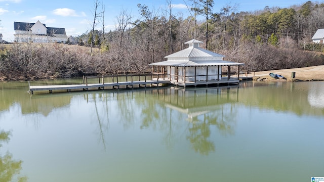 view of dock with a water view and a gazebo