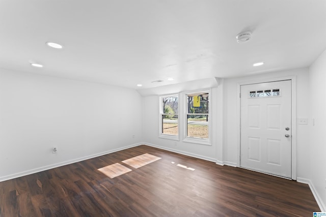 entrance foyer with dark hardwood / wood-style floors