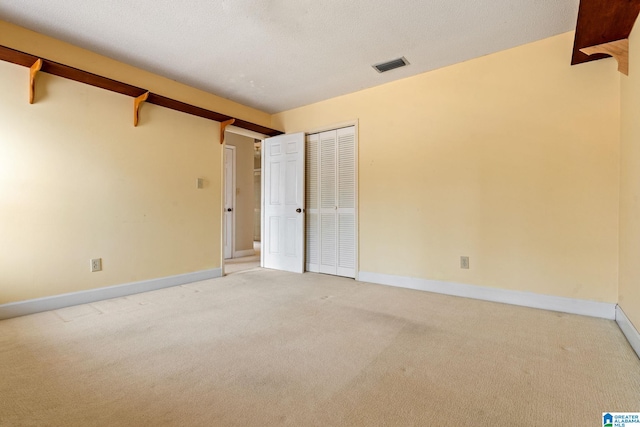 interior space with a textured ceiling