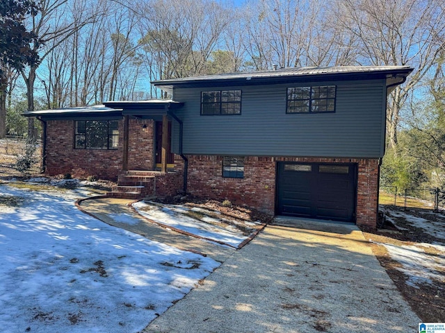 tri-level home featuring a garage