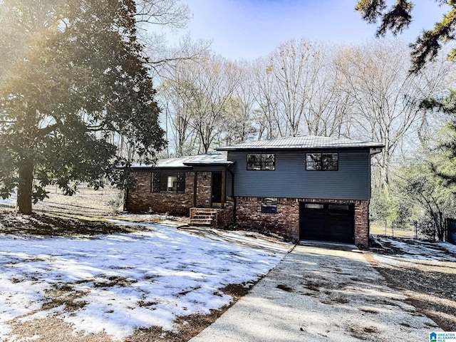 view of front of property featuring a garage