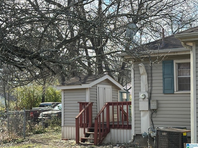 view of outbuilding featuring central AC