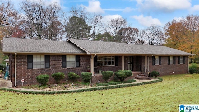 ranch-style home with a front yard