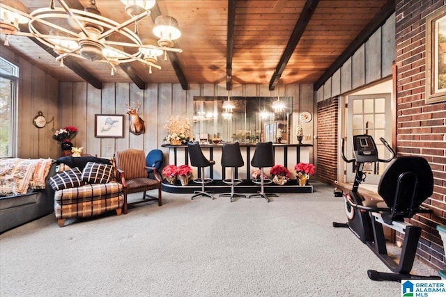 interior space featuring wood walls, carpet floors, and wood ceiling