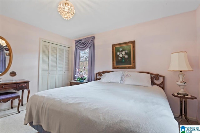 carpeted bedroom featuring a closet