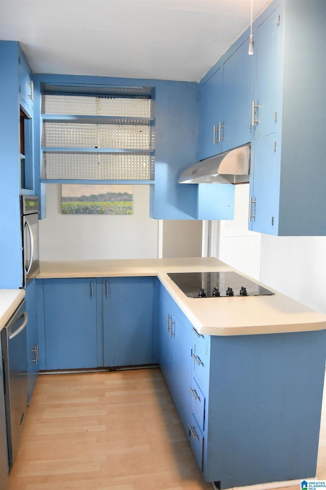 kitchen featuring dishwasher, light hardwood / wood-style flooring, black electric cooktop, blue cabinetry, and wall oven