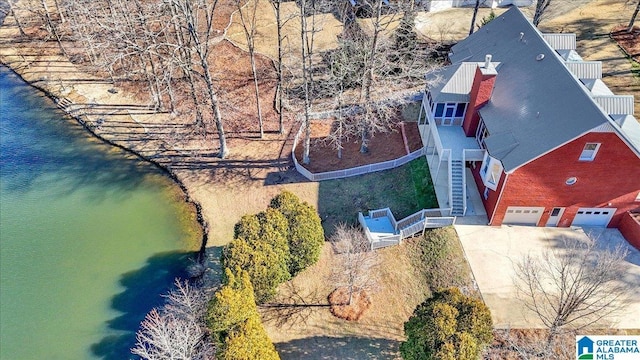 drone / aerial view featuring a water view