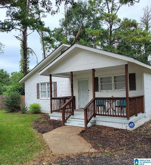 view of front of property featuring covered porch