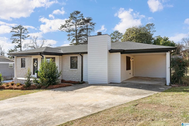 view of front of house with a carport