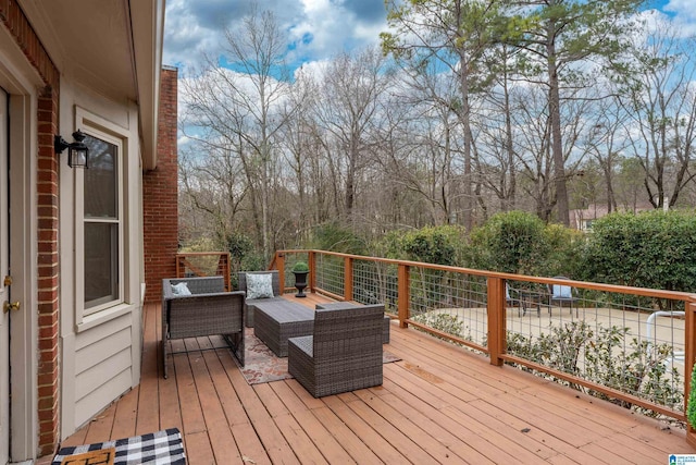 deck featuring outdoor lounge area