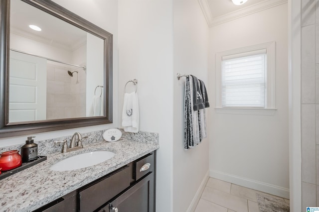 bathroom with tile patterned flooring, vanity, tiled shower, and crown molding