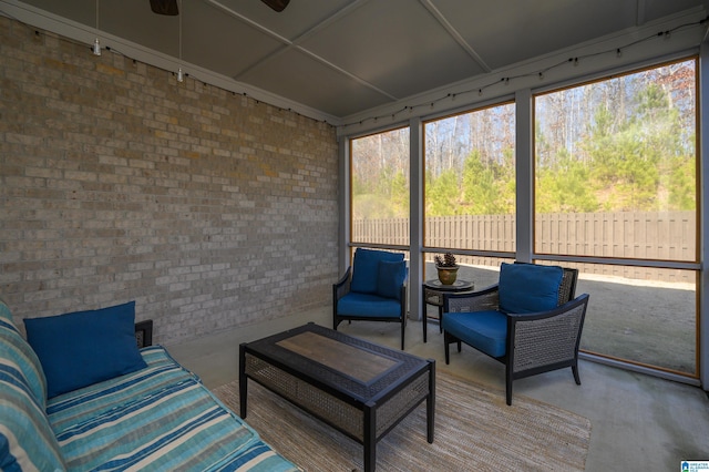 sunroom / solarium with ceiling fan