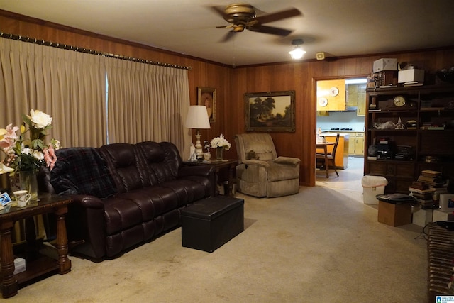 living room featuring carpet and ceiling fan