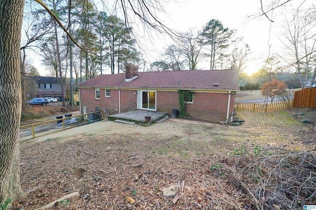 rear view of property with a patio area