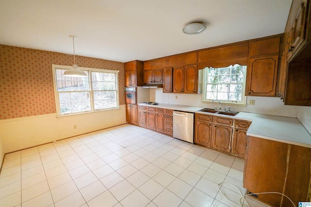 kitchen with sink, decorative light fixtures, stainless steel dishwasher, white gas stovetop, and wall oven