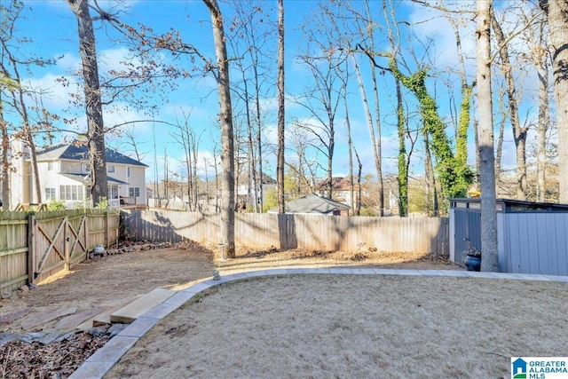 view of yard featuring a storage unit