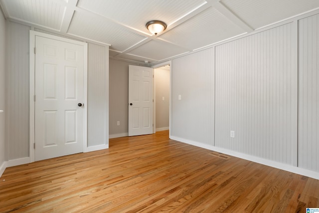 spare room with light hardwood / wood-style flooring