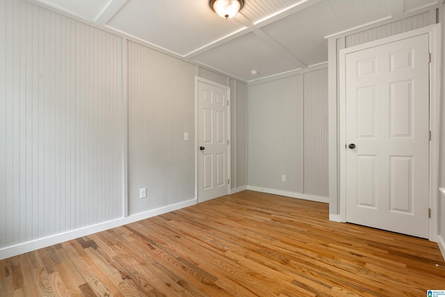 spare room featuring hardwood / wood-style flooring