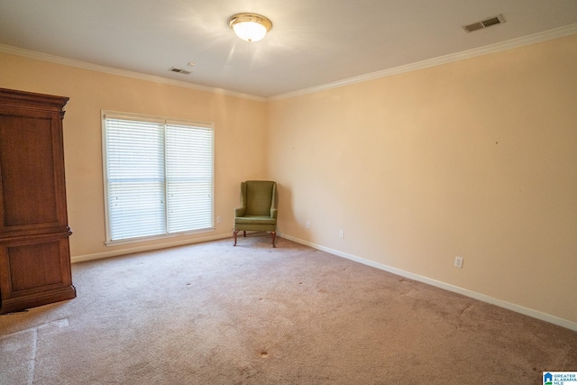 unfurnished room with light colored carpet and ornamental molding