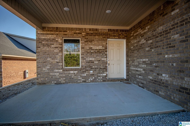 doorway to property with a patio