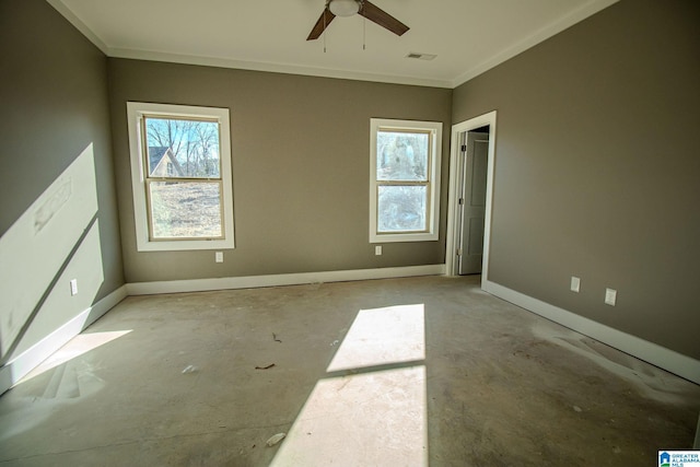 unfurnished room featuring ceiling fan and crown molding