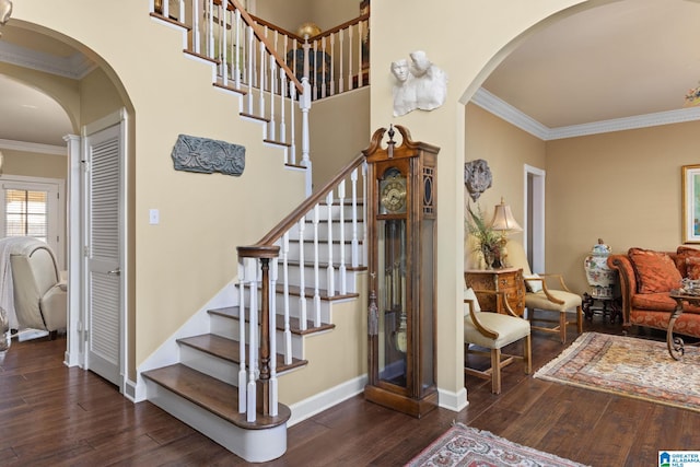 stairway featuring wood-type flooring and ornamental molding