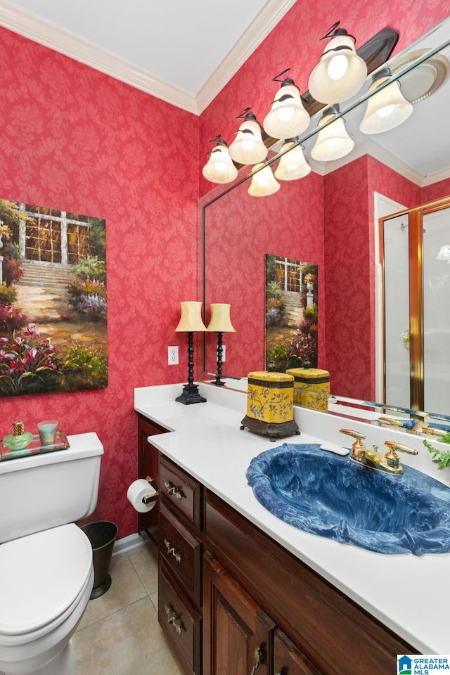 bathroom with tile patterned floors, crown molding, an enclosed shower, toilet, and vanity