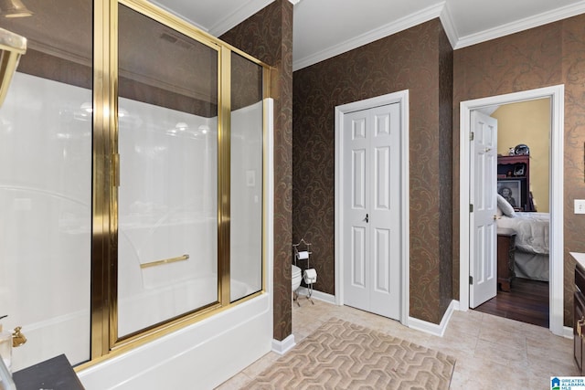 bathroom featuring tile patterned floors, ornamental molding, and bath / shower combo with glass door