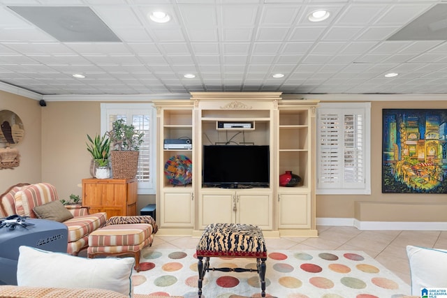 tiled living room with crown molding