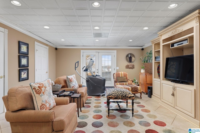 tiled living room with french doors and ornamental molding